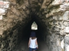 O exploring the many tunnels in Coba