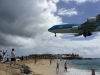 A KLM Boeing 747 landing over Maho Beach